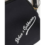 Close-up of Dolce & Gabbana Black Solid Nylon DG LogoPrint Clutch Zip Borse Pouch Bag with gold-tone hardware.