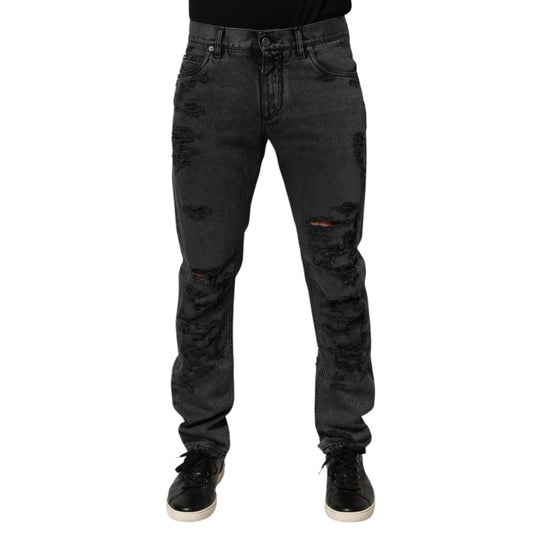 Dolce & Gabbana Black Tattered Skinny Cotton Men Denim Jeans with distressed detailing and five-pocket style.