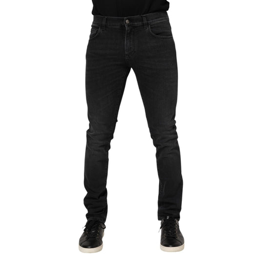 Dolce & Gabbana Black Washed Cotton Skinny Denim Jeans featuring zipper closure and logo details, made in Italy.