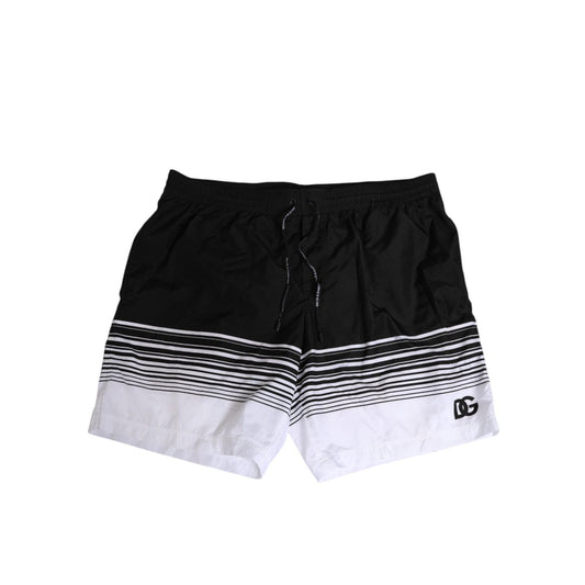 Dolce & Gabbana Black White Striped DG Logo Men Short Swimwear with elastic waistband and drawstring closure. Stylish beachwear.
