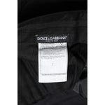 Dolce & Gabbana Black Wool Formal Dress Men Trousers Pants label with logo and Made in Italy text on black fabric.