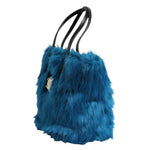 Dolce & Gabbana Blue Fur Logo Plaque Double Handle Shoulder Bag with silver metal detailing and black leather handles, side view.