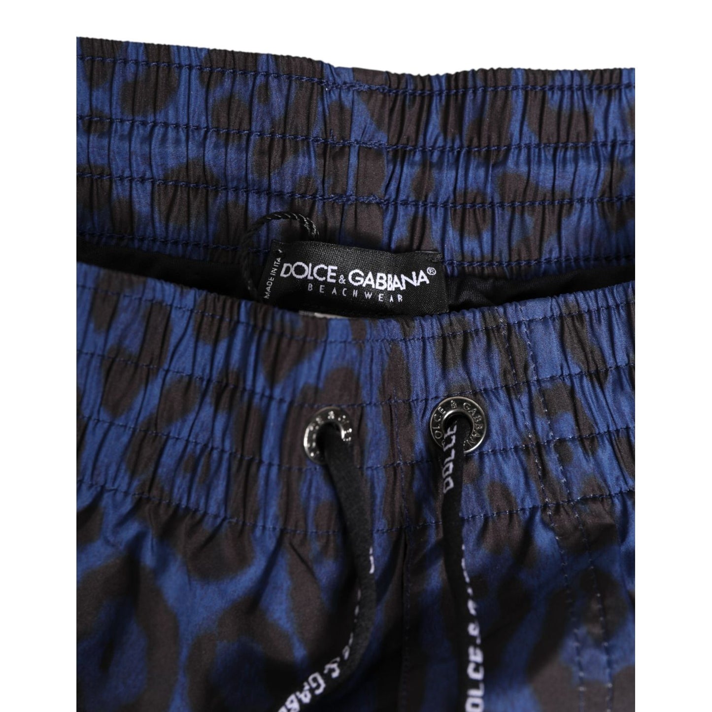Close-up of Dolce & Gabbana Blue Leopard Print Polyester Elastic Waistband Swimwear with drawstring and DG logo.