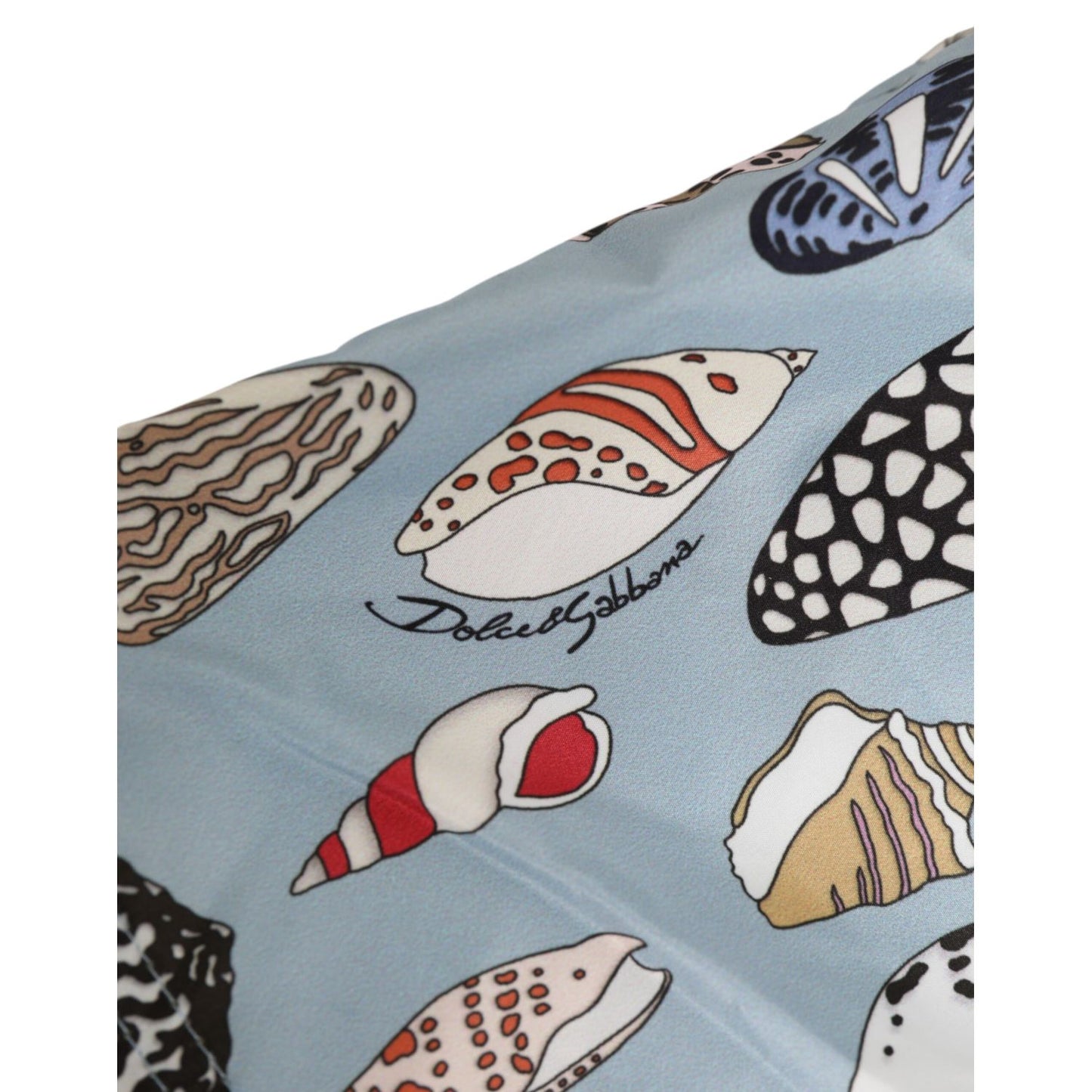 Dolce & Gabbana Blue Seashell Print Nylon Men Shorts Swimwear close-up of seashell print on blue fabric