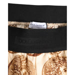 Dolce & Gabbana Brown Ancient Coin Print Silk Shorts Swimwear close-up of waistband and coin print design.