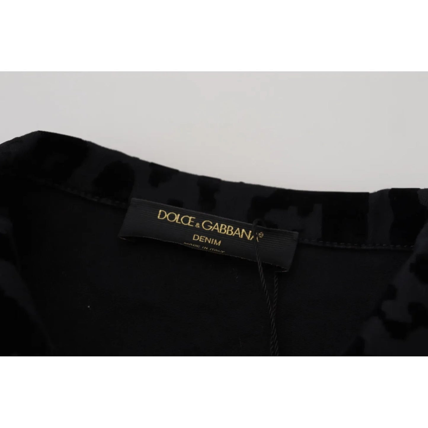 Tag on Dolce & Gabbana Cotton Black Leopard Long Sleeve Denim Jacket, featuring brand logo and exclusive craftsmanship.