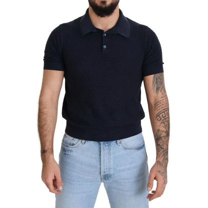 Man wearing Dolce & Gabbana Dark Blue Collared Polo Casual Silk T-shirt with short sleeves and collared neckline.