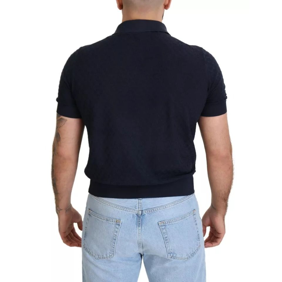 Back view of a Dolce & Gabbana Dark Blue Collared Polo Casual Silk T-shirt worn by a model.