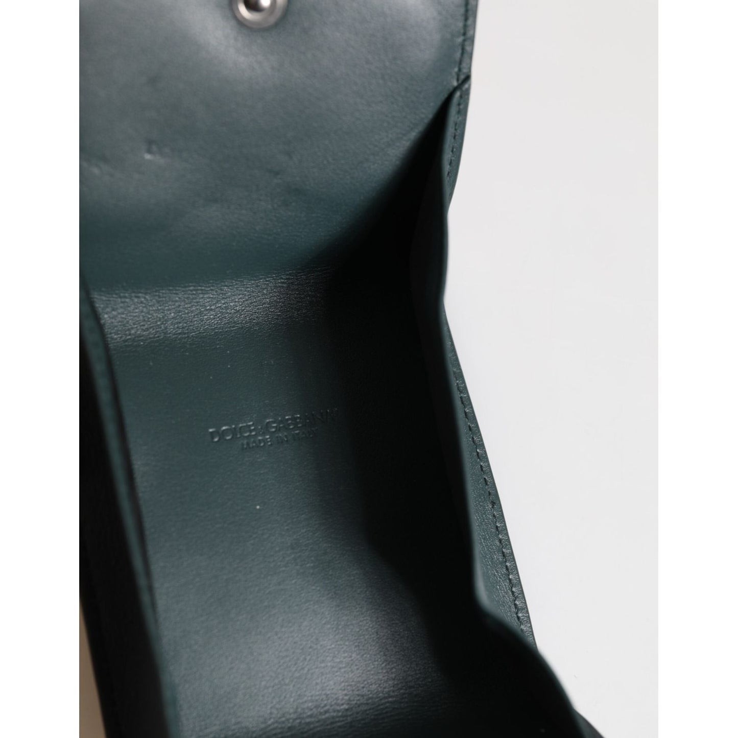 Inside view of Dolce & Gabbana Dark Green Leather DG Logo Coin Purse Bag Charm Wallet showing smooth leather texture.