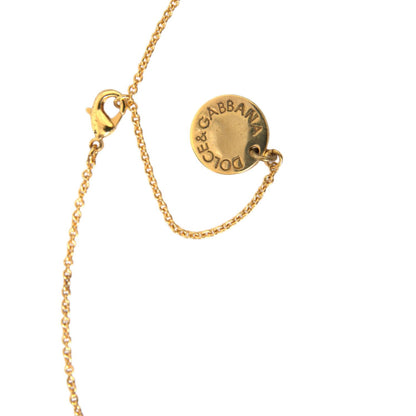 Dolce & Gabbana Gold Brass Chain Dog Heart Pendant Charm Necklace with logo detail and lobster closure, crystal embellishments.