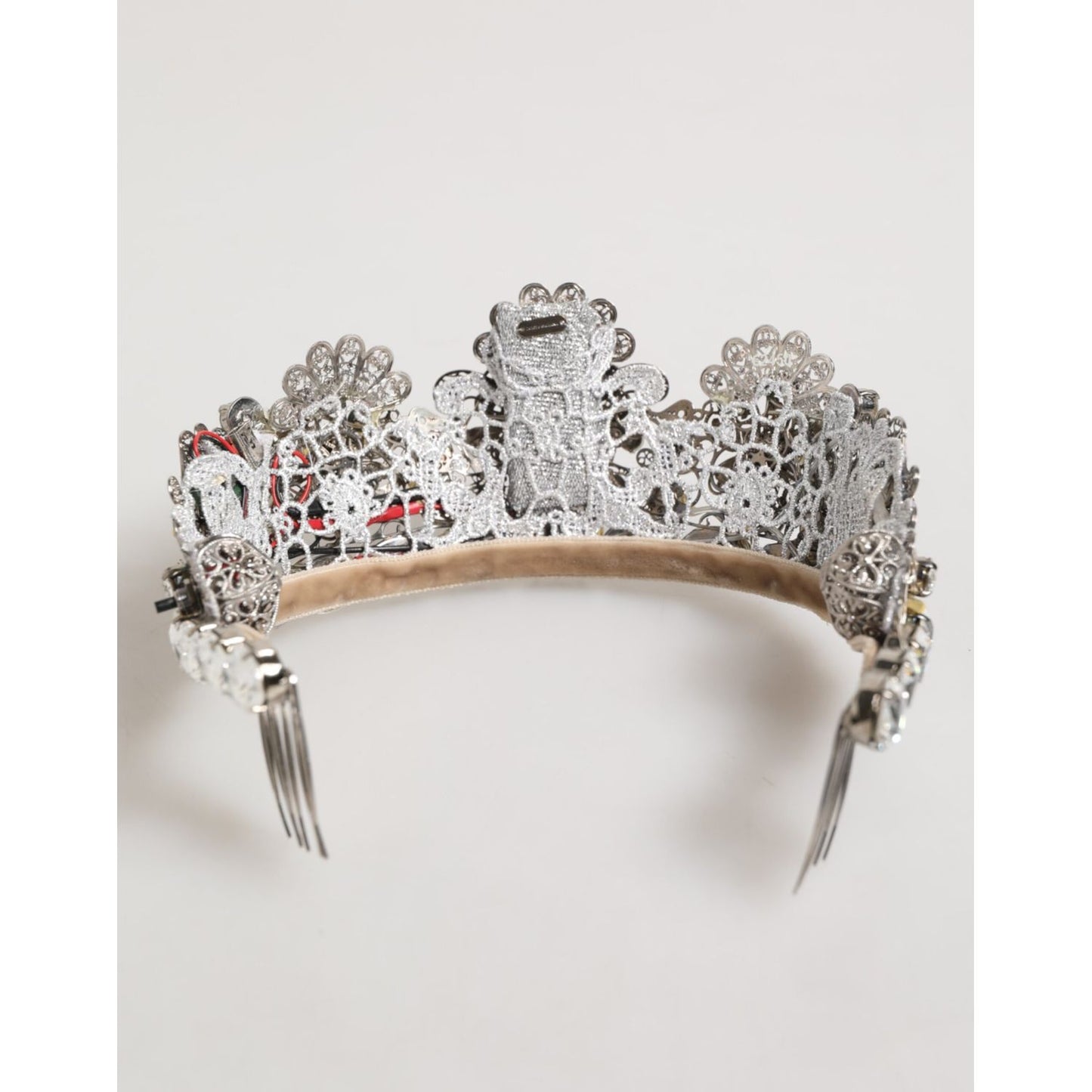 Dolce & Gabbana LED Crystal Embellished Silver Floral Filigree Crown Tiara on display, showcasing intricate details and sparkling crystals.