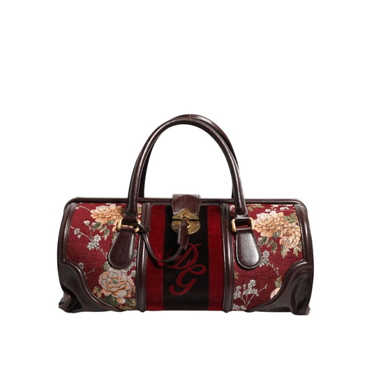 Dolce & Gabbana Multicolor Leather Jacquard Velvet Travel Duffle Bag with floral design and engraved logo hardware.