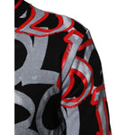 Close-up of Dolce & Gabbana Multicolor Logo Monogram Crew Neck Sweater, showcasing vibrant DG logo design on cotton fabric.