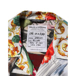 Close-up of Dolce & Gabbana Multicolor Shell Print Hawaii Casual Shirt collar with brand label and vibrant floral pattern