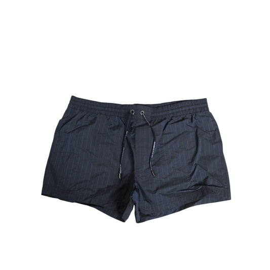 Dolce & Gabbana Navy Blue Polyester Nylon Pinstripe Men's Swimwear with logo drawstring and elastic waistband.