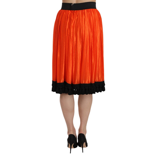 Dolce & Gabbana Orange High Waist Knee Length Skirt with black accents, back view, featuring zipper closure, made of nylon and silk.