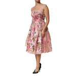 Dolce & Gabbana Pink Cotton Floral Pleated Sleeveless Dress with lily print, featuring adjustable straps and pleated skirt
