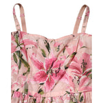 Dolce & Gabbana Pink Cotton Floral Pleated Sleeveless Dress with green and pink lily print, close-up of bodice.