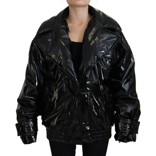 Woman wearing Dolce & Gabbana Polyester Black Shiny Blazer Women Jacket, glossy finish with long sleeves, exclusive Italian craftsmanship.