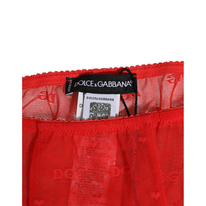 Close-up of Dolce & Gabbana Red Nylon Logo Lace Leggings Pants Underwear showcasing brand tag and red lace detail.
