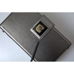 Dolce & Gabbana Steel Gray Leather Box Shape Shoulder Gold DG Logo Plaque Bag with polished gold-tone hardware and flap closure.