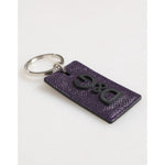 Dolce & Gabbana Violet Leather Logo Metal Ring Men Keychain Keyring with engraved metal hardware on white background.