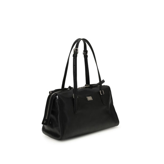 Dolce & Gabbana Vittoria Handbag in black leather with leather handles and monogalvanic logo plaque, elegant everyday accessory.
