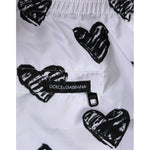 Dolce & Gabbana White Black Heart Print Men Boxer Short Swimwear with elastic waistband and DG logo detail.