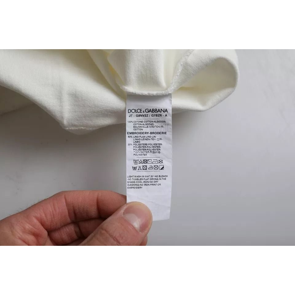Label of Dolce & Gabbana White Love & Peace Cotton Round Neck T-shirt showing care instructions