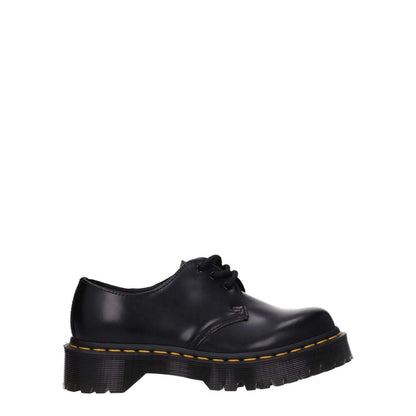 Dr. Martens Black Leather Oxfords And Derbies, casual lace-up design, rubber sole, mid heel, round toe.