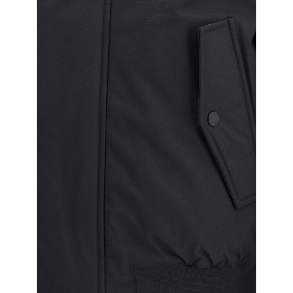 Close-up of Dsquared² Black Polyester Bomber, showing concealed zipper and front welt pocket with snap button closure.