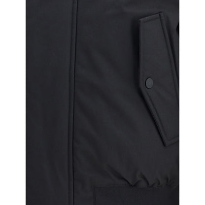 Close-up of Dsquared² Black Polyester Bomber, showing concealed zipper and front welt pocket with snap button closure.