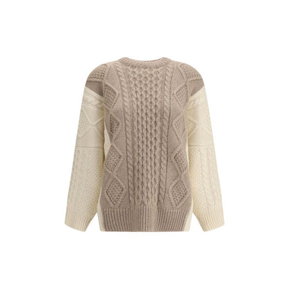 Ella Cream Cashmere Cashmere Sweater with two-tone cable-knit design, ribbed crewneck, hem, and cuffs for winter elegance.