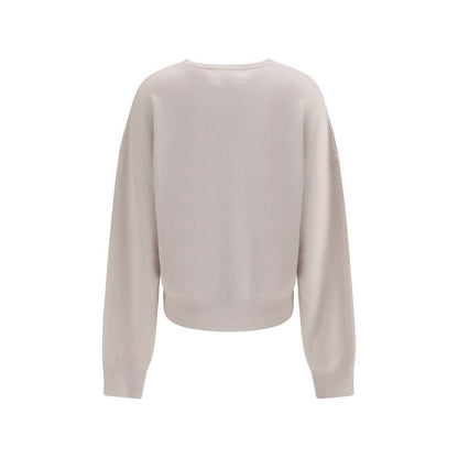 Back view of Extreme Cashmere Cream Cashmere Sweatshirt with crew neck and ribbed details, featuring soft and modern design for AW25.
