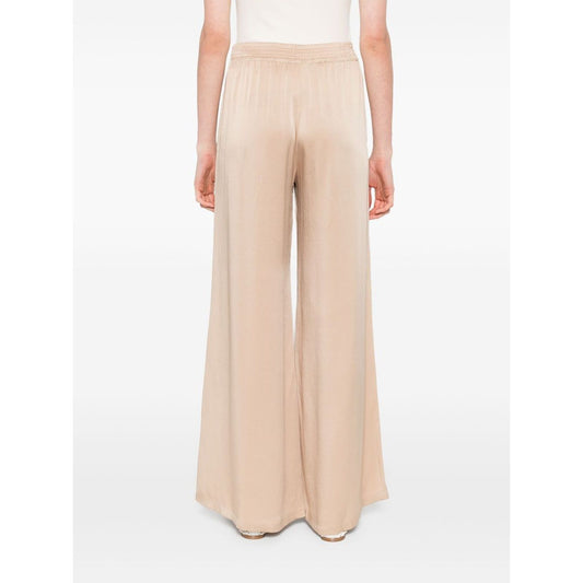 Back view of beige Fabiana Filippi Trousers Powder with elasticated waist, side pockets, straight hem, and wide-leg fit.