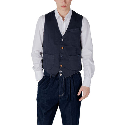 Model wearing Gianni Lupo Blue Cotton Waistcoat with white shirt and blue pants, showcasing front pockets and button closure.