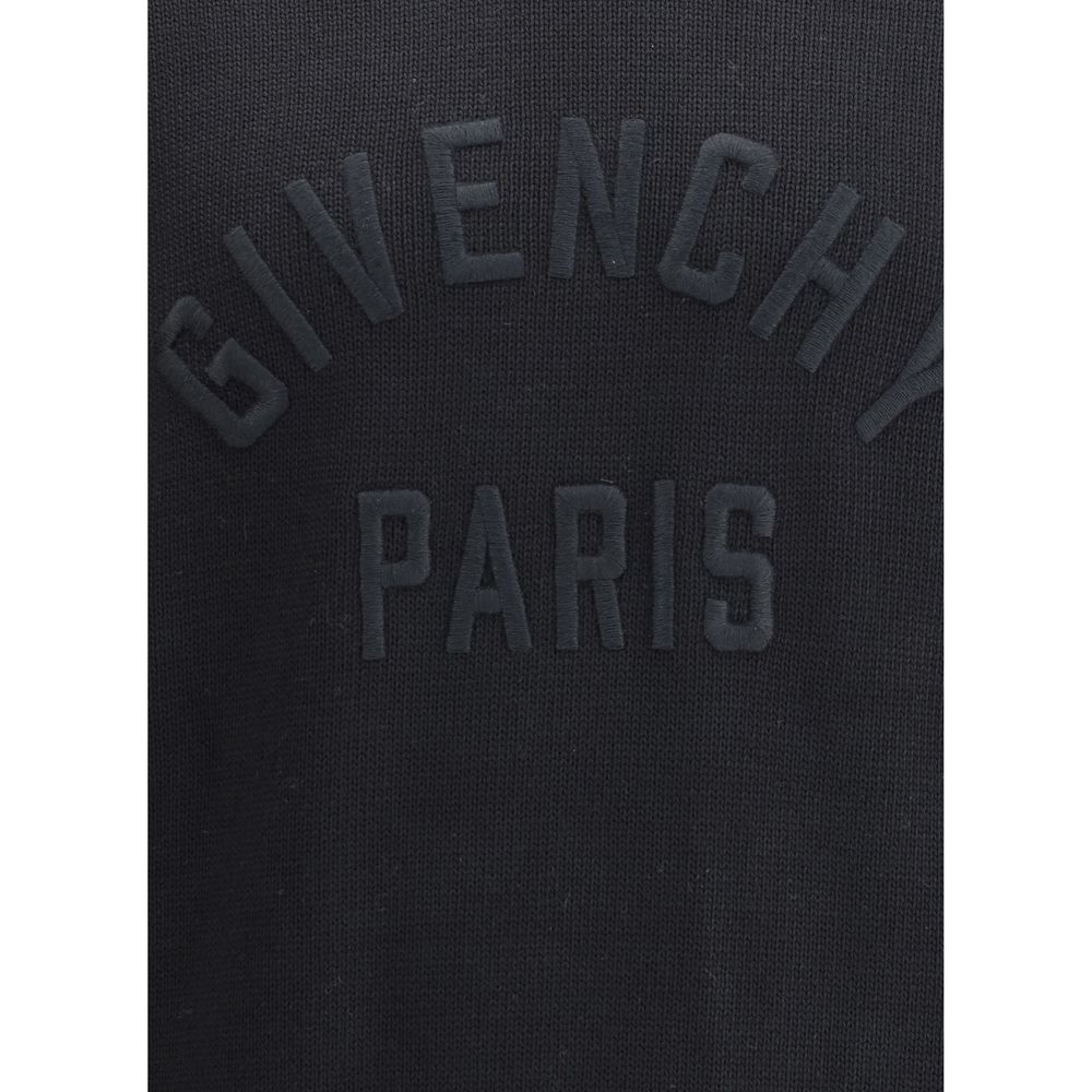 Givenchy Black Cotton Sweatshirt with embossed logo on chest, ribbed crew neck, cuffs, and hem. Made in Italy, elegant and comfortable design.