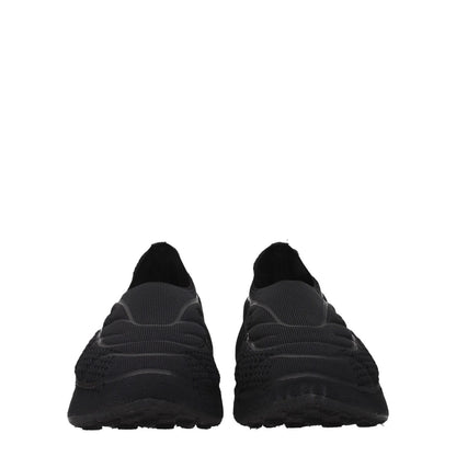 Givenchy Black Fabric Slip-On Loafers with round toe and side logo, fashion-forward casual footwear featuring 6 cm mid heels.