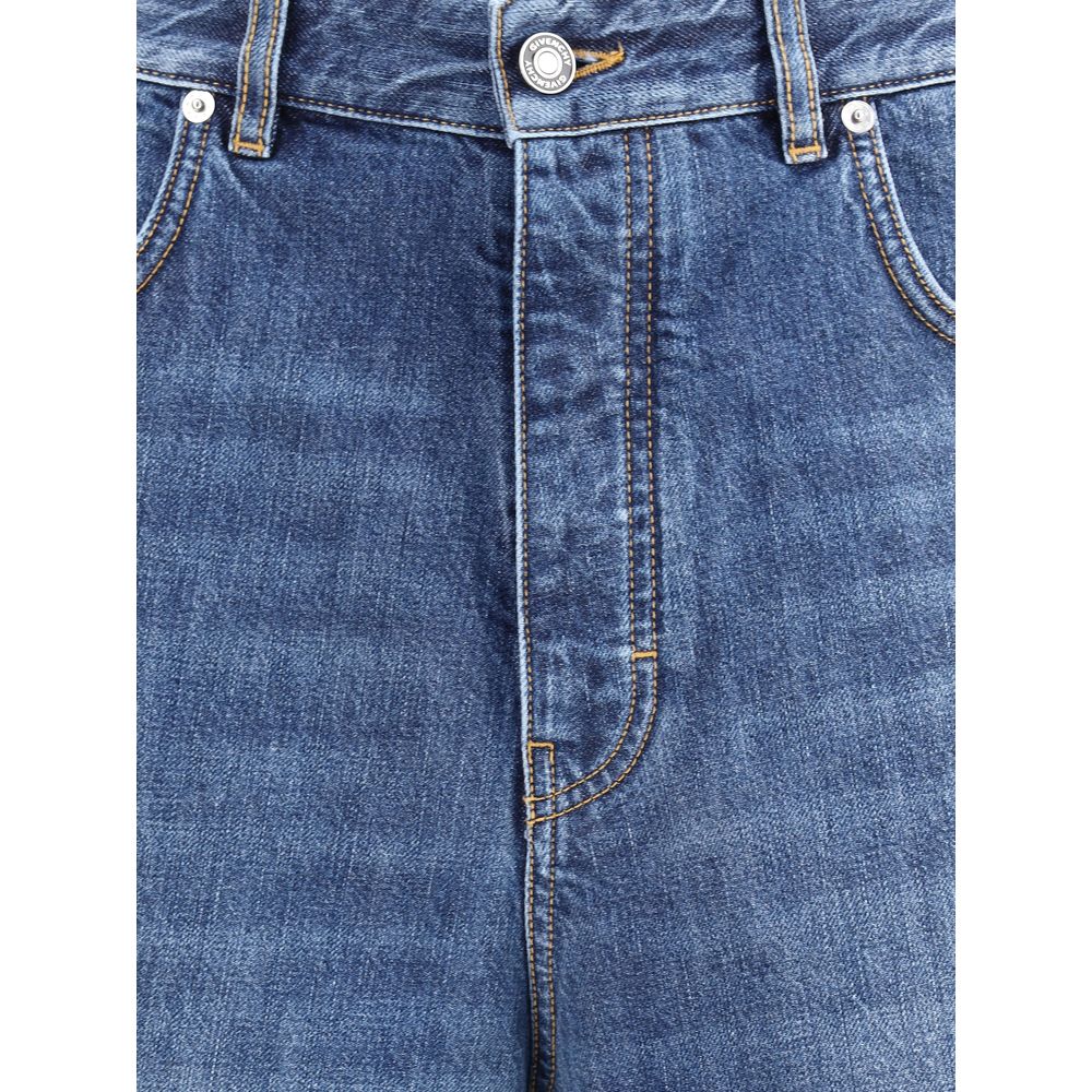 Close-up of Givenchy Blue Cotton Relaxed Fit Jeans with zipper closure and engraved button.