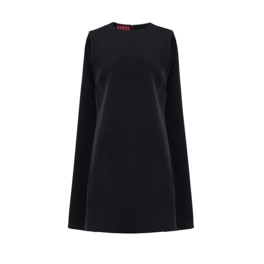 Gucci Black Wool Dress, short sleeveless bell shape, two side welt pockets, hidden back zip, 60s-inspired design with pleat stitching.