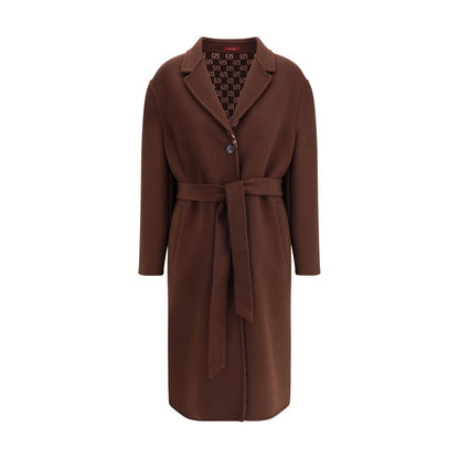 Gucci Brown Wool Coat featuring a reversible design with brown silk wool and GG patterned silk wool, complete with notch lapels and pockets.