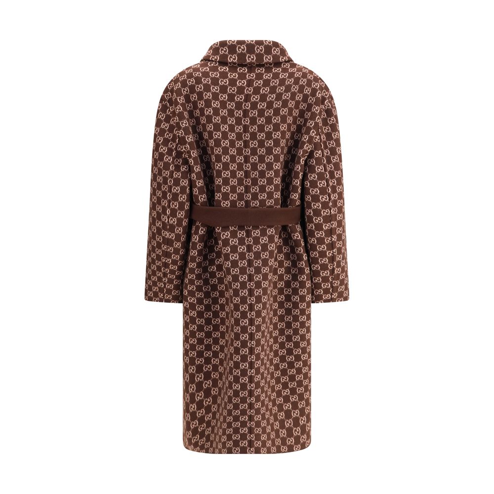 Gucci Brown Wool Coat, reversible design with GG pattern and notch lapels, showcasing elegance with two side pockets and button closure.