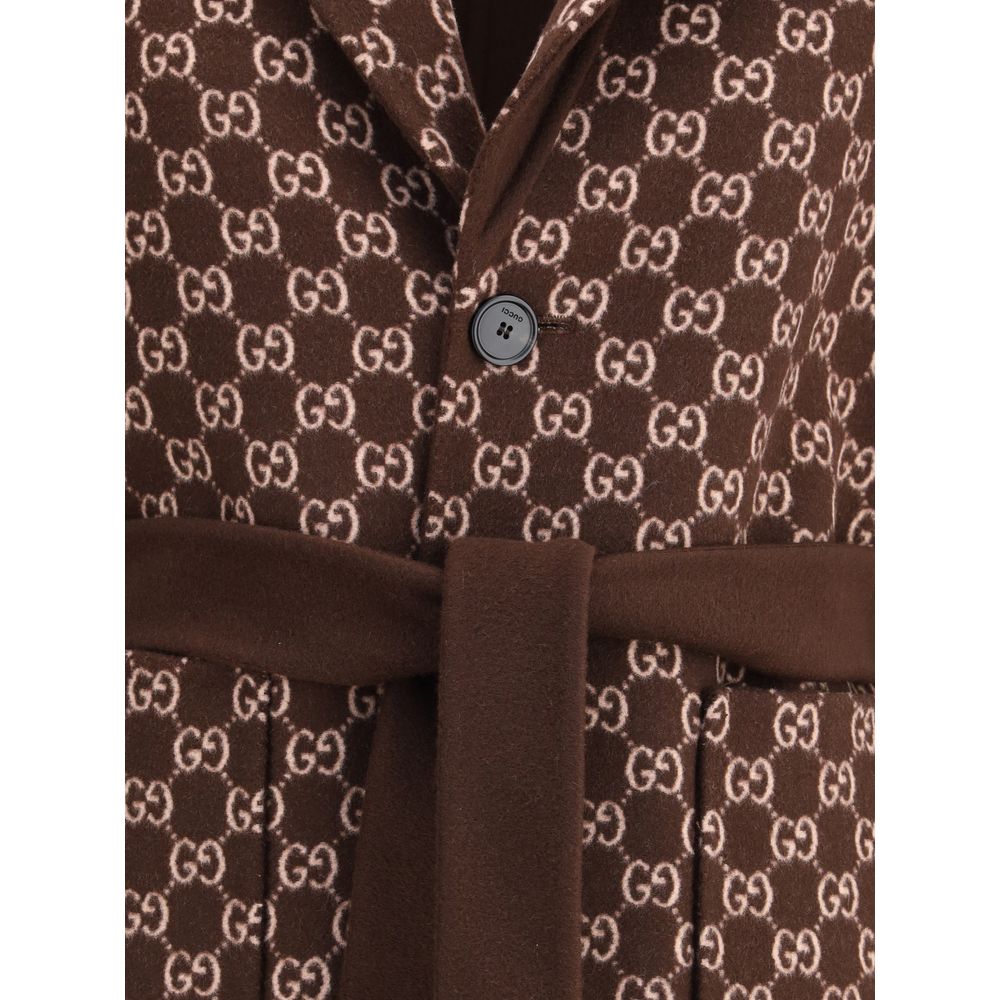 Gucci Brown Wool Coat with GG pattern and button closure, featuring reversible design and elegant notch lapels for sophisticated style.