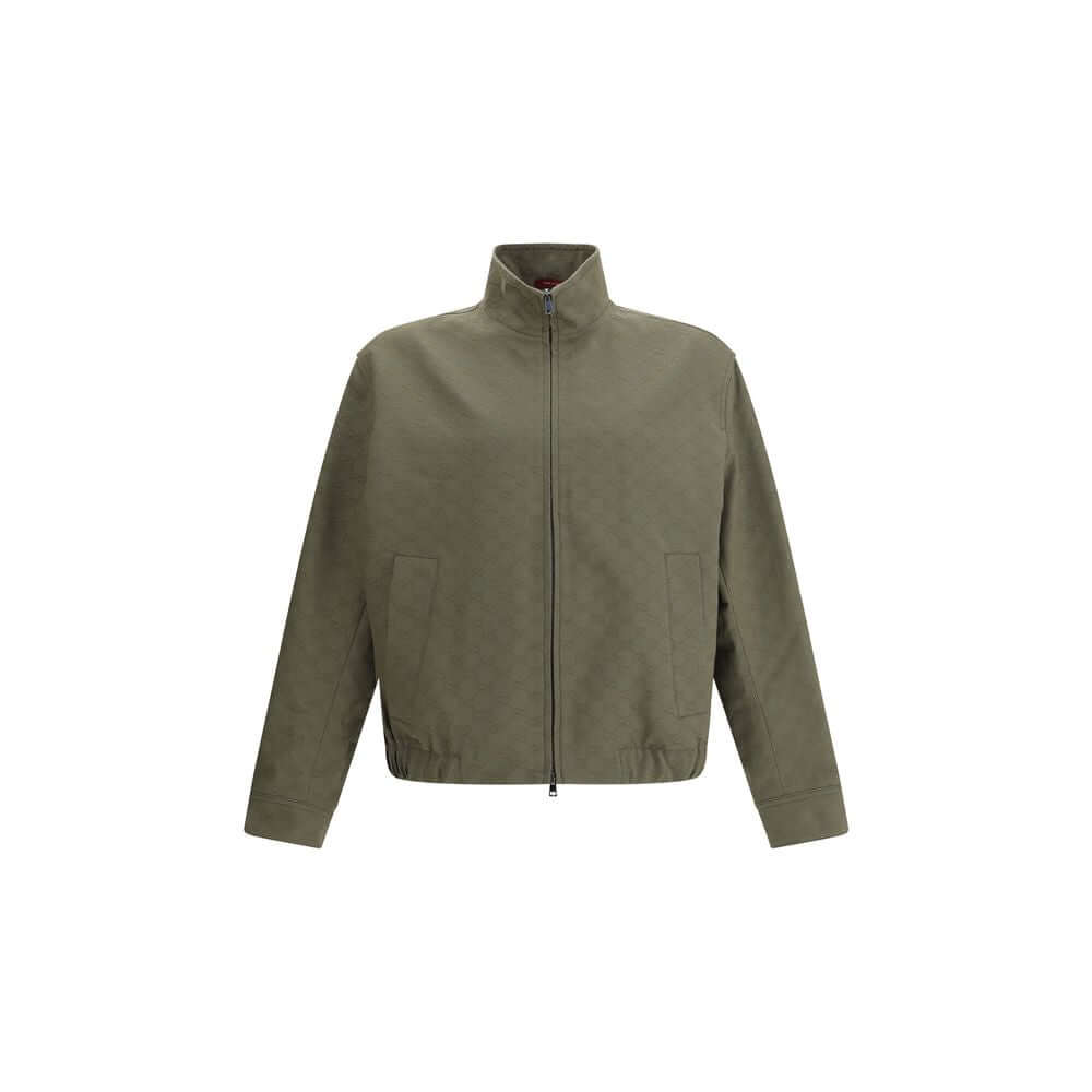 Gucci Green Cotton Bomber jacket with high collar, front zipper, side pockets, and ribbed hem. Made of 70% cotton and 30% polyester.