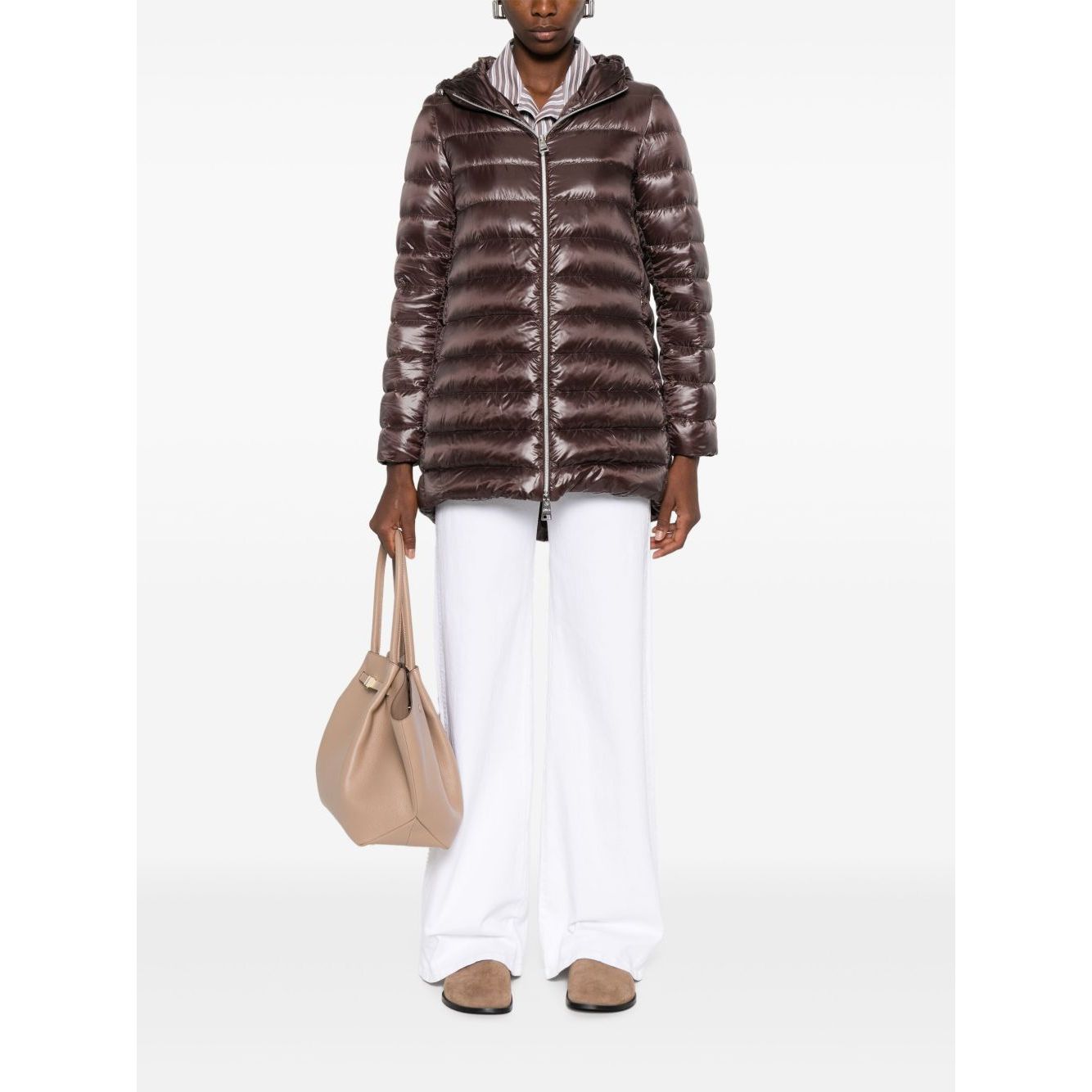 Model wearing Herno Coats Brown, chocolate brown midi down jacket with high-shine finish and two-way zip, holding beige bag.