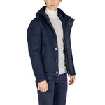 Alt Tag: Man wearing Hydra Clothing Blue Polyester Jackets & Coat for fall/winter collection with hood and buttons.