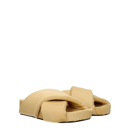 Jil Sander Beige Horsehair Slippers with open toe and leather sole, featuring a vintage effect and low heel in champagne color.