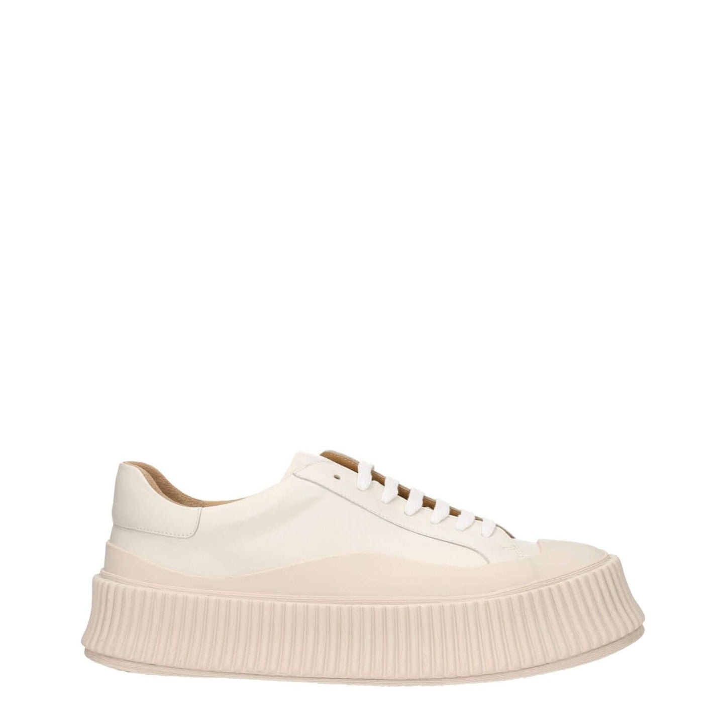 Jil Sander Beige Leather Platform Sneakers with wedge heel, lace-up closure, and rubber sole showcasing aged effect design.