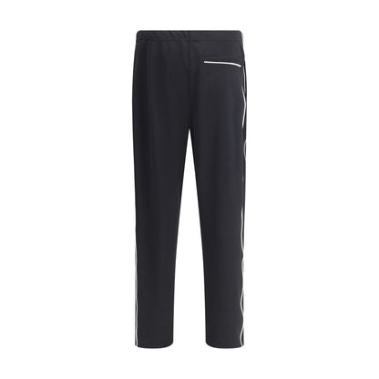 Kenzo Black Polyester Joggers (Workout Pants) with elastic waistband and logo flower, perfect for sporty style.