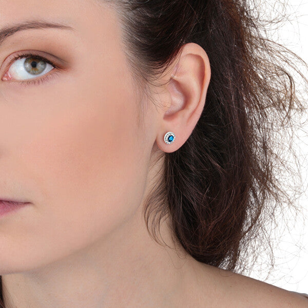 LA PETITE STORY JEWELRY Mod. LPS02ARQ15 earring on model's ear showcasing elegant design and craftsmanship.